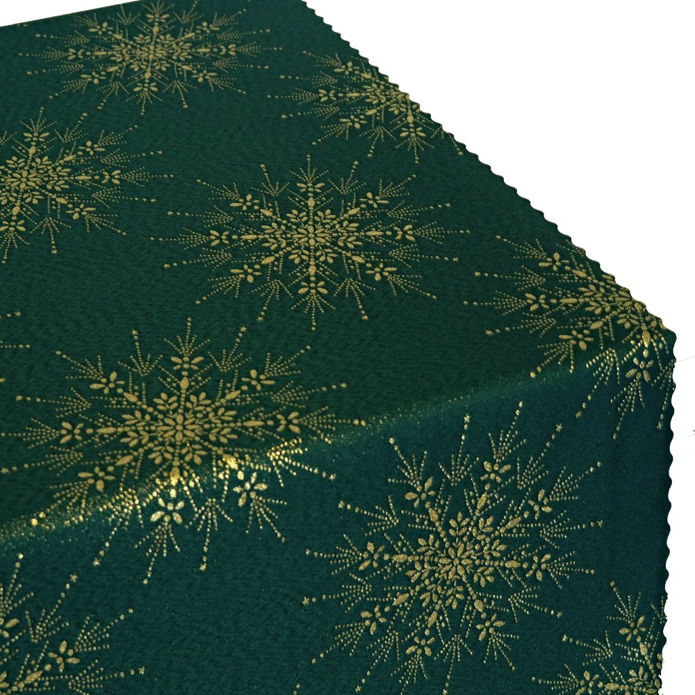 Vánoční teflonový ubrus VLOČKY zlaté na zelené